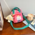 Cute pink canvas crossbody bag with green strap, casual cute mobile phone pouch for daily wear - Pink + Cheese Pendant