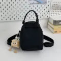 Black mini canvas backpack casual shoulder crossbody bag with cute plush doll keychain - With Plush Pendant / Black