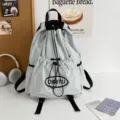 Sac à dos léger gris avec cordon de serrage pour femme et homme, sac d'école de voyage loisir. - L / Gris