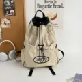 Sac a dos cordon leger, beige et noir, grande capacite pour voyage, ecole et sport quotidien. - L / Beige