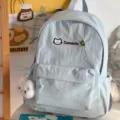 Light blue casual backpack with cute cat embroidery, multi-pocket design, perfect for daily use. - Blue with Cat