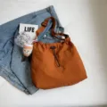 Bolso bandolera de lona ligero informal para mujer, bolso tote de gran capacidad para uso diario. - Naranja + Café divertido