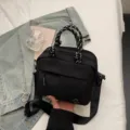 Casual black multi-compartment crossbody bag with braided handles for women daily commute. - S / Black