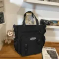 Black canvas tote bag large capacity messenger bag student multi-pocket shoulder bag with plush - Black With Pendant / Black