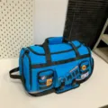 Borsone da viaggio blu multifunzionale con grande capienza, manici resistenti e patch eleganti. - Azzurro