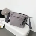 Women nylon crossbody bag casual lightweight canvas shoulder bag with cute astronaut charm - With Pendant / Light Gray