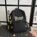 Black casual backpack with large capacity for daily school travel and student use. - Black Large