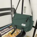 Japanese style canvas messenger bag for women and men, large capacity casual crossbody bag. - Green