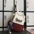 Canvas school backpack in white and maroon color block design with cute plush pendant. - Red Small + Grey Frog