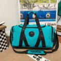 Turquoise reistas voor fitness en sport, grote waterdichte weekendtas voor sportreizen. - Meerblauw