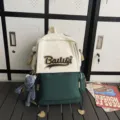 Canvas contrast color backpack with cute plush pendant, large capacity student school bag. - Green Small + Grey Frog