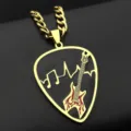 Detailed view of the stainless steel guitar pick pendant with black music note inlay necklace. - Gold