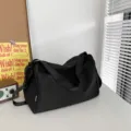 Black canvas gym duffel bag for women and men, large capacity travel shoulder bag. - Black