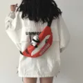 Trendy red white crossbody chest bag with cute panda plush, casual streetwear waist bag. - With Panda Doll / Orange