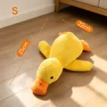 Vue de détail d'un jouet à mâcher pour animal en peluche canard jaune en velours. - S / Canard tactique jaune S