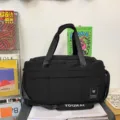 Black large capacity travel duffel bag for gym sports and student boarding luggage use. - Black