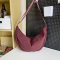 Large capacity solid color casual crescent crossbody bag for daily commute and travel. - Chestnut