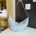 Light blue crescent shoulder bag for women, large capacity dumpling crossbody bag for casual daily use. - Light Blue