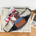 Marsupio color-block da uomo e donna, elegante borsa a tracolla con tasche in rete. - Blu & Arancione