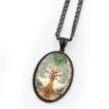 Vintage tree of life pendant necklace with black metal chain and oval glass cabochon design. - Black C