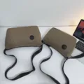 Casual canvas crossbody bag for daily travel, lightweight shoulder bag with adjustable strap. - S / Khaki