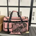 Pink sports duffel bag for women and men, large capacity fitness travel bag with shoe compartment. - Pink