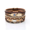 Multi-layer braided leather bracelet with evil eye feather charm and magnetic clasp for women. - Coffee
