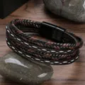 Pulsera de cuero trenzado multicapa con cierre magnético, diseño elegante marrón y negro. - Marrón
