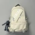 Grosser Kapazitaet Freizeit Studenten Rucksack in Beige mit stilvollem Frontdruck Anhaenger. - Weiß + Grauer Frosch Anhänger
