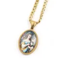 Collier chaîne gourmette dorée avec un pendentif ovale portrait vintage d'une dame. - Or D