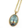Gold chain necklace with oval tree of life glass pendant, stylish fashion jewelry accessory. - Gold G