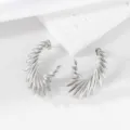 Minimalist silver wing hoop earrings, unique stainless steel geometric jewelry for women. - Silver