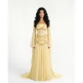 Yellow strapless sweetheart corset evening dress with beaded details and flowing floor-length skirt. - Yellow