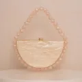 Elegant semicircular acrylic evening clutch with pearlescent beaded handle, chic champagne chic. - Champagne