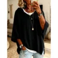 Losse poncho trui met capuchon voor dames, effen korte mouw gebreide top voor mode. - S / Zwart