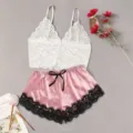 Detailed view of the elegant lace camisole and satin shorts pajama set flat lay scene. - S / 5000 White - 5001 Pink