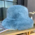 Blue fuzzy bucket hat detail shot, showing soft faux fur texture and warm winter hat design. - M (56-58cm) / Light Blue