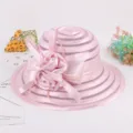 Detail view of the pink organza sun hat, showing the delicate flower bow and sheer brim texture. - M (56-58cm) / Pink