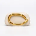 Elegant beige evening box clutch bag with bold sculptural gold handle for party style. - Leather Ivory