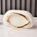 White PU round evening clutch bag with elegant golden curved metal handle for women party. - White
