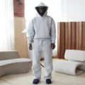 Detailed view of the casual solid gray oversized hoodie and sweatpants matching lounge set. - S / Top And Bottom / Gray