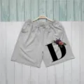 Grey casual women's shorts featuring a stylish letter D and floral print pattern for summer daily wear. - S / Gray