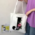 Borsa tote in tela con lettera J e stampa floreale, borsa a spalla casual da donna. - Lettera J / 15x13