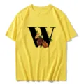 Yellow short sleeve t-shirt featuring a large black letter W with vintage floral print design. - S / Tops / Letter W