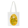 White canvas tote bag with cute Easter bunny and egg print, perfect for holiday shopping. - 22722