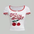 White short sleeve crop top with red lace trim, cute bow, and Cherry Bomb letter print. - S / White