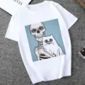 Casual white short-sleeve t-shirt featuring a unique skeleton and cat graphic print design. - XS / Tops / 21049