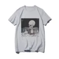 Grey short-sleeve women's t-shirt featuring a unique skeleton and cat graphic print detail. - S / Tops / Gray 21061