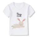 Kids white short sleeve t-shirt featuring cute Easter bunny graphic and festive text design. - 24M / White 22724