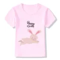 Pink kids short sleeve t shirt featuring cute easter bunny graphic detail close up view - 24M / Pink 22724